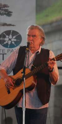 Guy Clark, American folk singer-songwriter. , dies at age 74