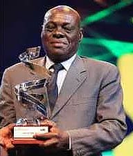 Thigo with his Hall of Fame award in 2018